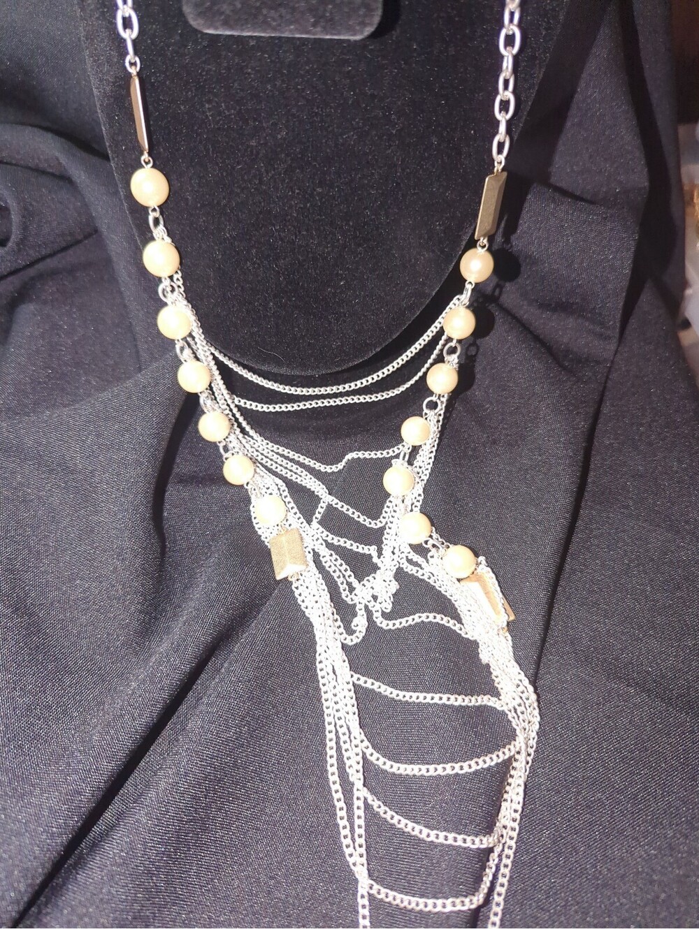 Lydell Silver Tone Multi-Chain Necklace with Cream Beads and Gold Accents